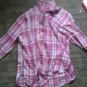 it is  a pink flannel shirt and it is a small
